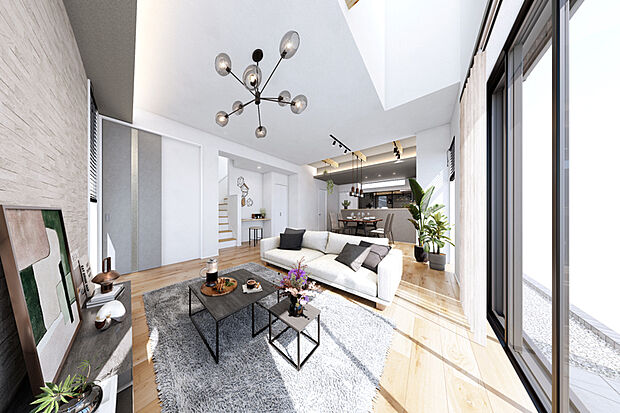 【開放感を高める吹抜けのある暮らし】
天井高を活かした吹抜設計が、空間に縦の伸びやかさと光の広がりを創出。自然光に包まれた明るいリビングが、家族の時間をより心地よく彩ります。※2号棟LDK完成予想図