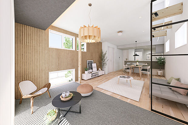 【くつろぎを深める広縁の家】
吹き抜けのある明るいリビングの先に設けた、広縁空間。壁の一面に使用したウッドパネルの凹凸が創り出す陰影が印象的なLDKです。※モデルハウス6号棟(2025年10月撮影)