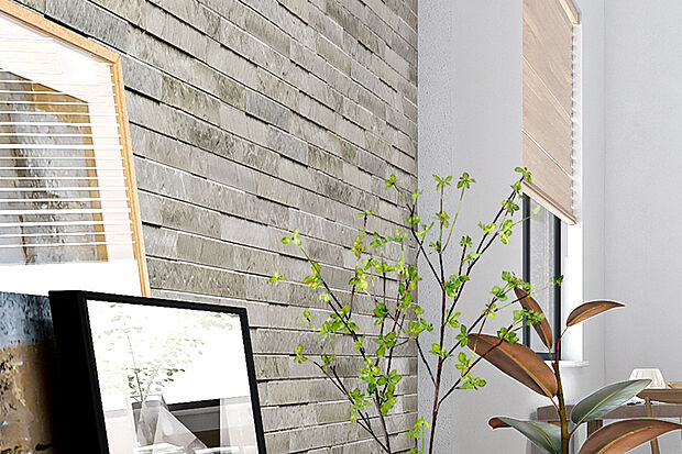 【グラビオエッジ】
リアルな素材感で、空間に豊かな表情を生み出し、上質な空間へと演出するデザインウォールをリビングの一部に採用。心地よい空間を演出します。