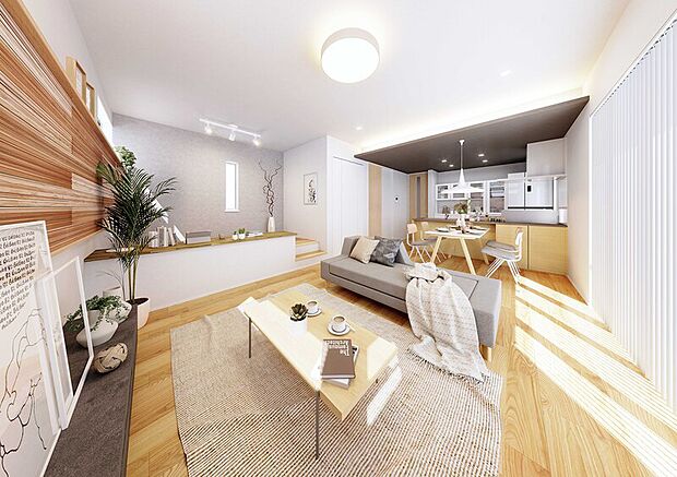 リビングの一角を小上がりにしたステージリビング。段差により空間をゆるやかに区切ることで、開放感をそのままに一体感のある空間に。