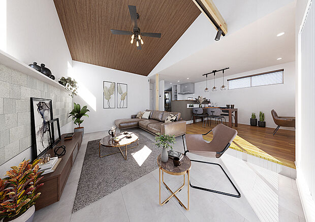 たっぷり陽光が差し込む2階リビングには、床を一段下げたサンクンリビングを採用。また、勾配天井が縦へと広がるに美やかな開放感を演出。