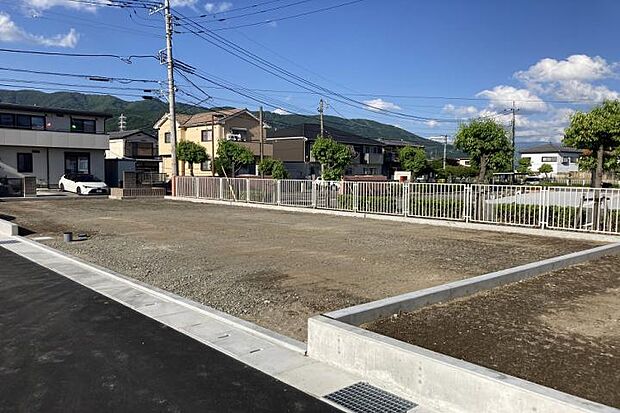 No.1_土地（撮影_2024年5月）敷地南西より撮影。土地面積206.22m2（62.38坪）