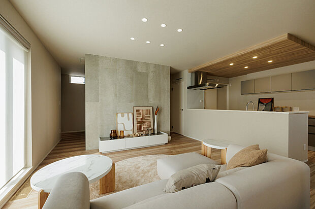 【【2号棟　リビング】】家族が集うリビングは、広い開口から差し込む光でいつも明るく、心地よいひとときを演出。対面キッチンからは会話を楽しみながら調理ができ、家族とのつながりを大切にできます。（2025年9月撮影）