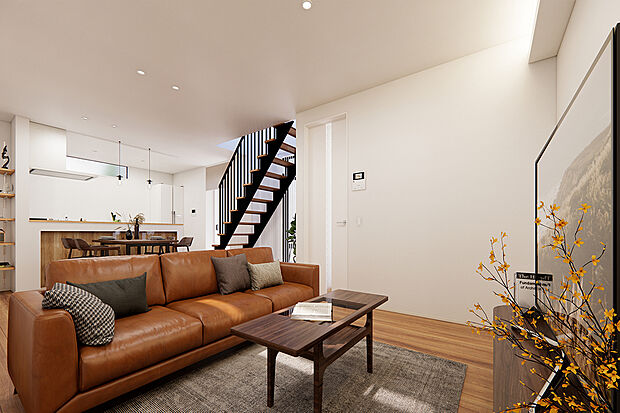 【1号地：LDK】21.74帖のひろびろLDKには家族と自然に顔を合わすことができるリビング階段を採用/完成予想パース