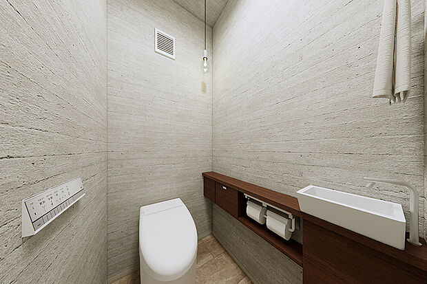 【トイレ】建売では珍しいタンクレストイレを採用。「ウォシュレット」の便座とノズル・ケースには防汚効果の高いクリーン樹脂を採用。汚れをはじくから、汚れてもサッとひと拭き。（完成予想パース）