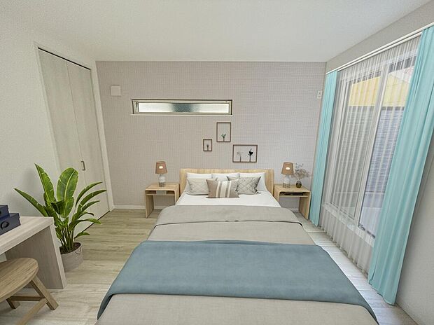 【 洋室】2階東側の洋室です。
シンプルに仕上げた洋室は、家具やインテリアで自由にお部屋を楽しめます。バルコニーへと開いた窓から、心地よい風が通り抜けていきます。