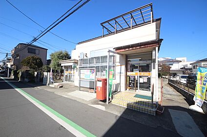 新座栄郵便局 約457m