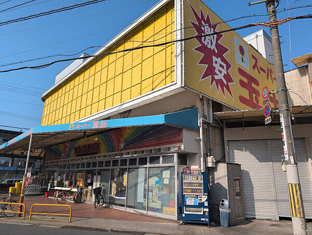 スーパー玉出寝屋川店（約414m）