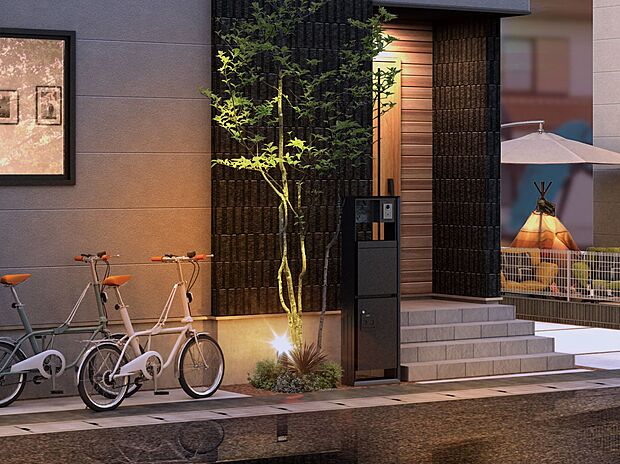 【完成予想図(外観)】【エクステリアライト】夜の街を明るく照らす門柱にエクステリアライトを採用。防犯灯としても役立ちます。（街並完成予想図）