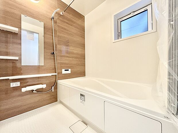 落ち着いた雰囲気でゆっくりお寛ぎいただけるバスルーム