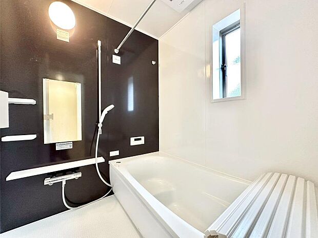 落ち着いた雰囲気でゆっくりお寛ぎいただけるバスルーム