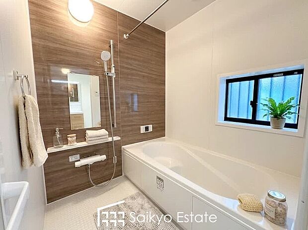 【浴室【施工例】】一日の疲れを癒してくれる落ち着いた色合いのバスルーム♪雨の日のお洗濯も安心な浴室乾燥機付きです。