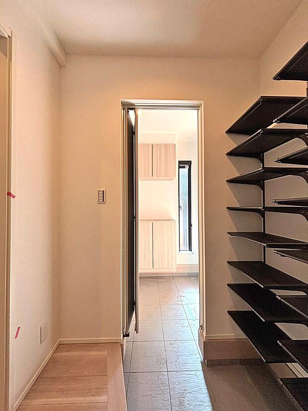 住まう人の帰り、訪れる人を優しく迎える安らぎに満ちた空間 上質感あふれるエントランス