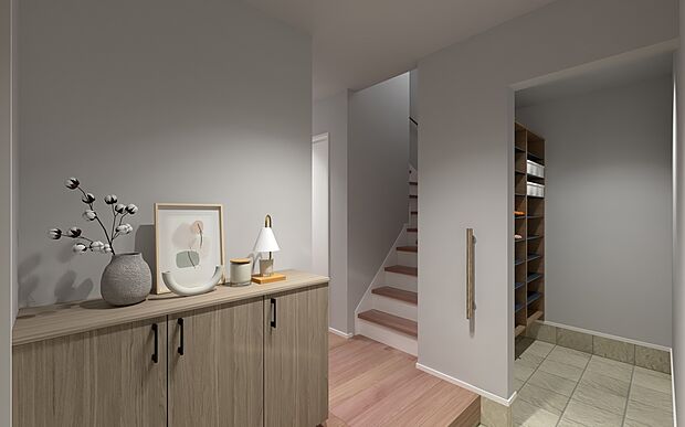 【No.17│玄関】家族全員分の靴が収まる大容量のシューズクロークを完備。散らかりがちな玄関も常に美しく保てます。お気に入りの雑貨を飾れるカウンターが、訪れる人を温かく迎えます。