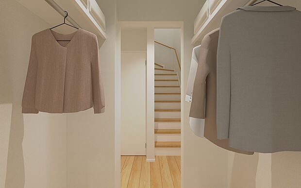 【No.3号棟 1階ウォークインクローゼット（※CG）】ユーティリティの横に配置された便利な動線の収納スペース。上着やバッグをすぐに掛けられ、帰宅後の片付けもスムーズ。家族の暮らしを整える頼もしいクローゼットです。
