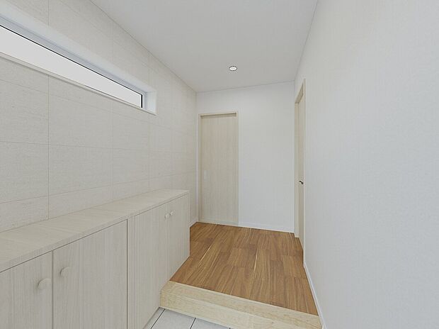 【白で統一した明るい玄関】プライバシー性の高い横長窓で採光も確保※完成イメージ画像