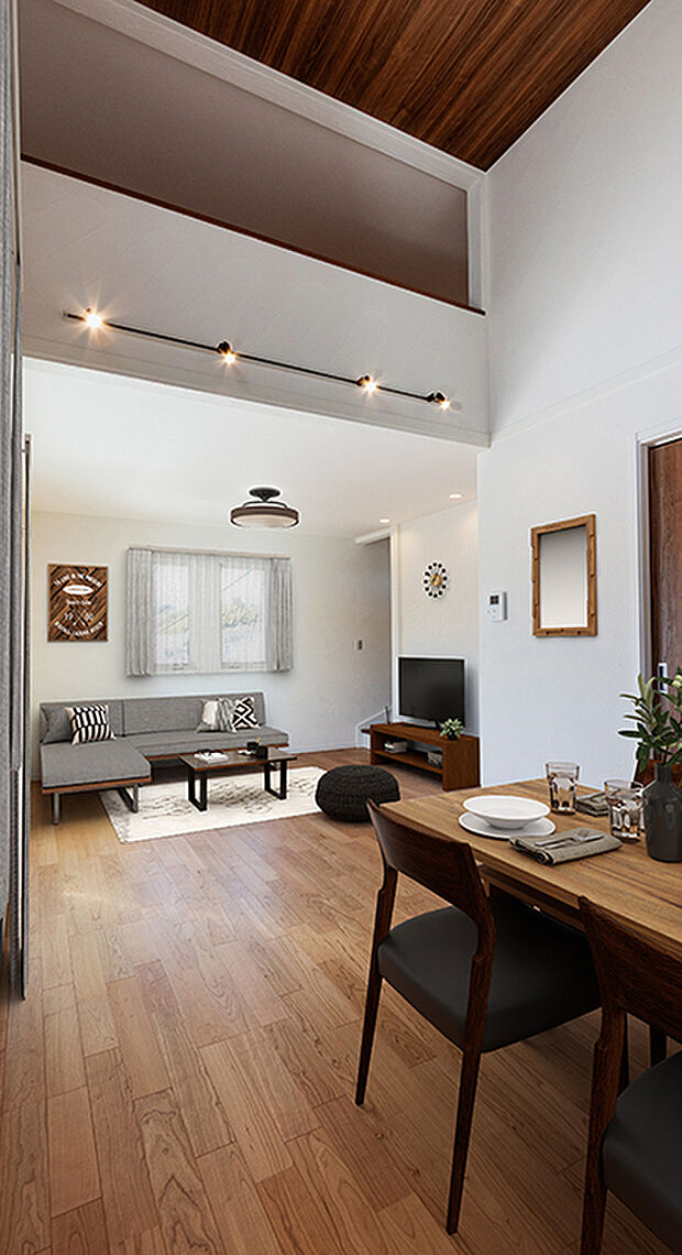 【TAKIHOUSE リビング (2号棟)現地+家具CG】開放感のある勾配天井付きの2階のリビングはフロア全てを使い、広さを演出しています。固定階段付きの大型ロフト約7.0帖~約8.25帖で部屋として利用可能なエアコンコンセントにテレビ用CD管を設置。