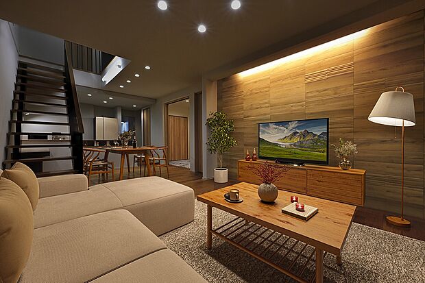 家族が集うリビングルーム。くつろぎの空間に彩りを添えるアクセントウォールがお洒落な空間を演出します。(1号棟※建物は現物となります。生活イメージの喚起のために家具を合成しております。)