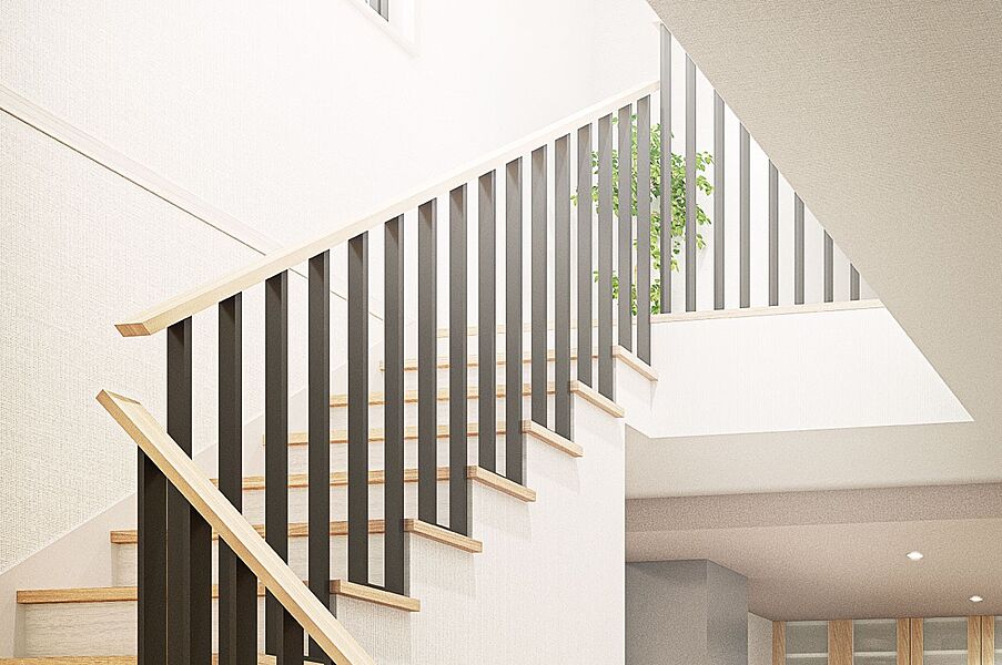 屋外の開放感を邸内に移すLDKの吹抜け。リビング階段とのコンビネーションにより、空間にさらなる立体的な広がりを生み出します。（6号棟内観完成予想図）