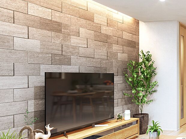 【アクセントウォール】リビングの一角に「エコカラットプラス」を採用。機能とデザインが調和し、くつろぎの空間を上質に演出します。