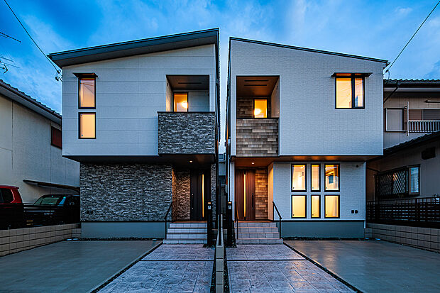 T-2、T-1／夜の街並みに美しく溶け込む、玉善の外観デザイン。上質な灯りが、住まう人の時間を静かに包み込みます。