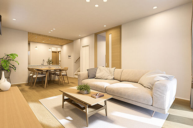 【リビングダイニング完成予想図】T2/ナチュラルオークの優しい色合いに包まれる19.3帖の広々LDK。美しい木目が温かな雰囲気を醸し出します。陽だまりのような心地よさの中で、家族団欒の時間をゆったりと育める空間です。