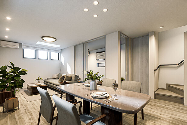 【リビングダイニング完成予想図】T-2／19.6帖の広々としたLDKに4.0帖の和室が続く開放感あふれる空間。柔らかな光に満たされ、家族が自然と集まり思い思いに寛ぐ「家族の幸せ」の象徴。リビング階段が空間と生活動線を繋ぎます。