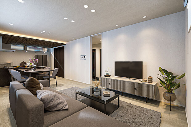 【リビングダイニング完成予想図】T-1/視界を遮らない伸びやかな空間構成が、圧倒的な奥行きと開放感を創出。天井の間接照明が視線を奥へと誘い、空間全体に深みを与えます。どこにいても広さを感じられる、開放的で心地よい場所です。