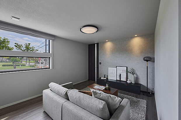 【リビング】T-3/角地ならではの開放感あふれる住まいは、窓から心地よい自然光がたっぷりと降り注ぎます。窓の向こうには緑豊かな公園が広がり、季節の移ろいや子どもたちの遊ぶ姿を眺めながら、穏やかな時間を過ごせます。