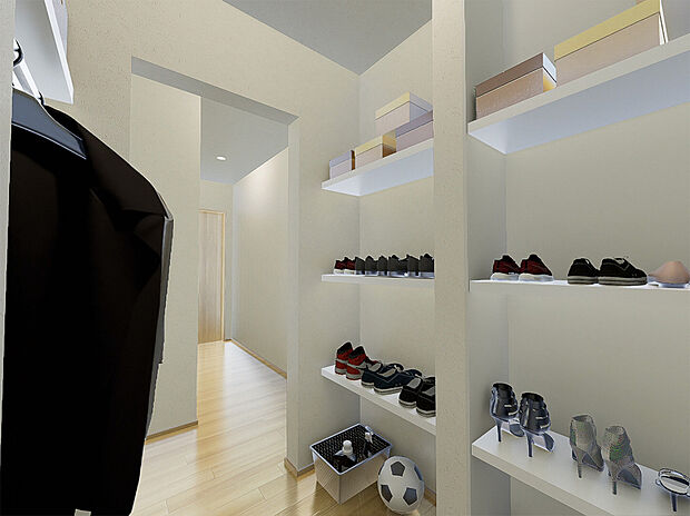 【シューズクロゼット】玄関を入るとすぐに、大容量の収納スペースがあります。目隠しドア付きなので、来客時も安心です。※施工事例です。実物とは異なります。