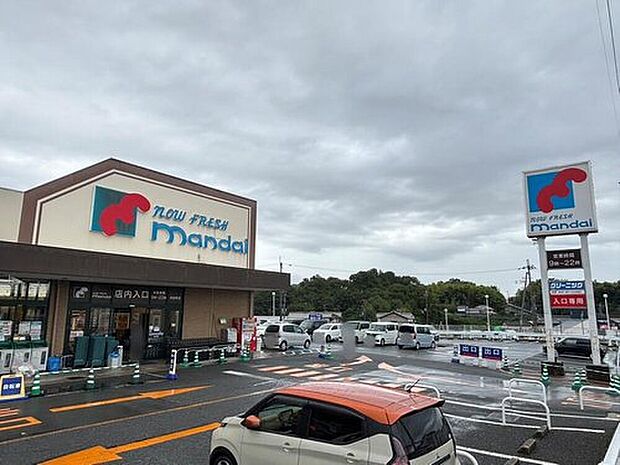 万代河合町店（約1,120m）
