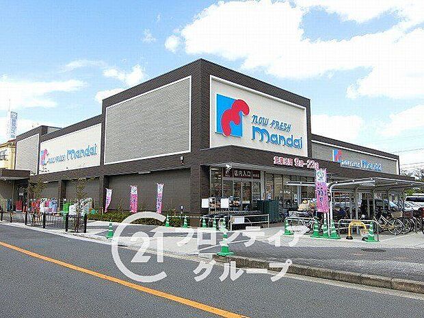 万代郡津店（約530m）