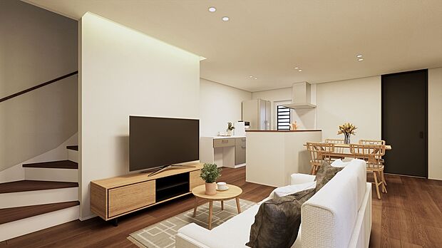 リビングからダイニング、キッチンまで見渡せる一体感のあるLDK。間接照明のやわらかな光が、くつろぎの時間を心地よく演出します。