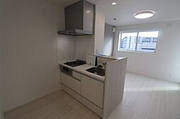 Skyes residence塚越 5階1LDKのリビング/ダイニング