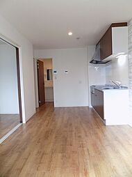 プレミアムスイート狭山駅前 3階1DKのリビング/ダイニング