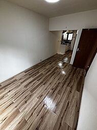 ポルシェ聖蹟桜ヶ丘II 106 1階ワンルームのリビング/ダイニング