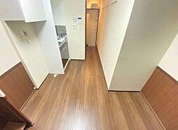 ルームズ中野 A棟 1階ワンルームのリビング/ダイニング