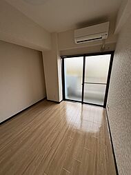 ホワイトウィング越野 204 2階ワンルームのリビング/ダイニング