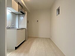 ＬＡＵＲＥＬ西新井栄町 1階ワンルームのリビング/ダイニング