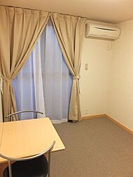 レオパレスブルーム スミ 4階1Kのリビング/ダイニング