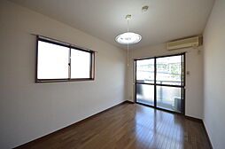 多摩都市モノレール 中央大学・明星大学駅 徒歩3分の賃貸アパート 2階1Kのリビング/ダイニング