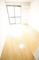 京王線 聖蹟桜ヶ丘駅 徒歩4分の賃貸アパート 2階1Kのリビング/ダイニング