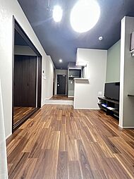 ジーイーオンズ 1階1LDKのリビング/ダイニング