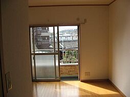 カーサドマーニ 202 2階2Kのリビング/ダイニング