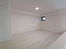 ハーモニーテラス南小岩A 1階ワンルームの寝室