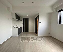 ＣＵＯＲＥ城陽 101 1階1LDKのリビング/ダイニング