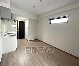 ＣＵＯＲＥ城陽 105 1階1LDKのリビング/ダイニング