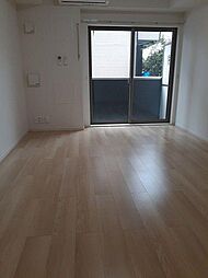 グレイス・ゴッド 102 1階1Kのリビング/ダイニング