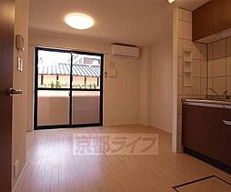 近鉄京都線 久津川駅 徒歩4分の賃貸マンション 1階1LDKのリビング/ダイニング