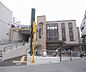 周辺：スーパーマーケットツジトミ 淀店まで65m 淀駅前のスーパー 大型駐車場ありです